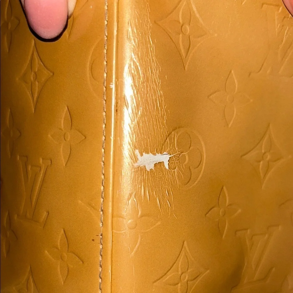 LOUIS VUITTON Gold Tote with Iconic Embossed Design